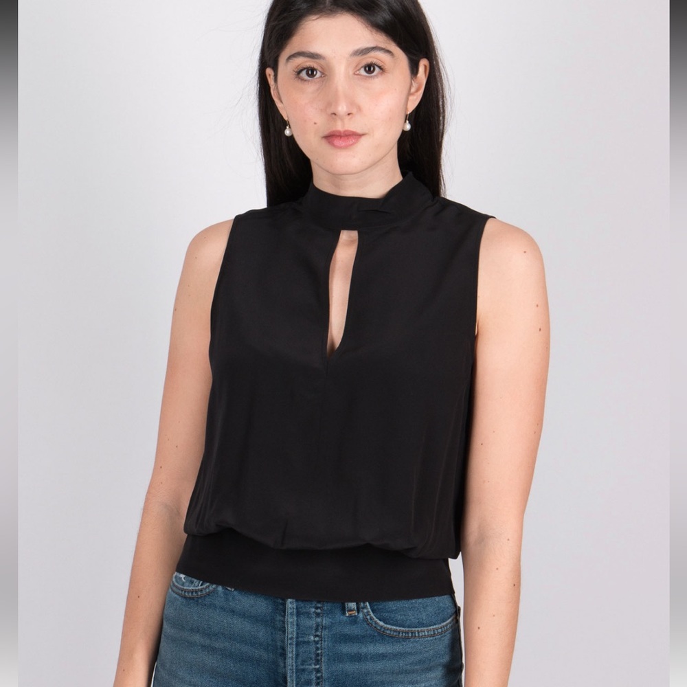 Frame sleeveless top size extra small. Black. High neckline with deep v cut.